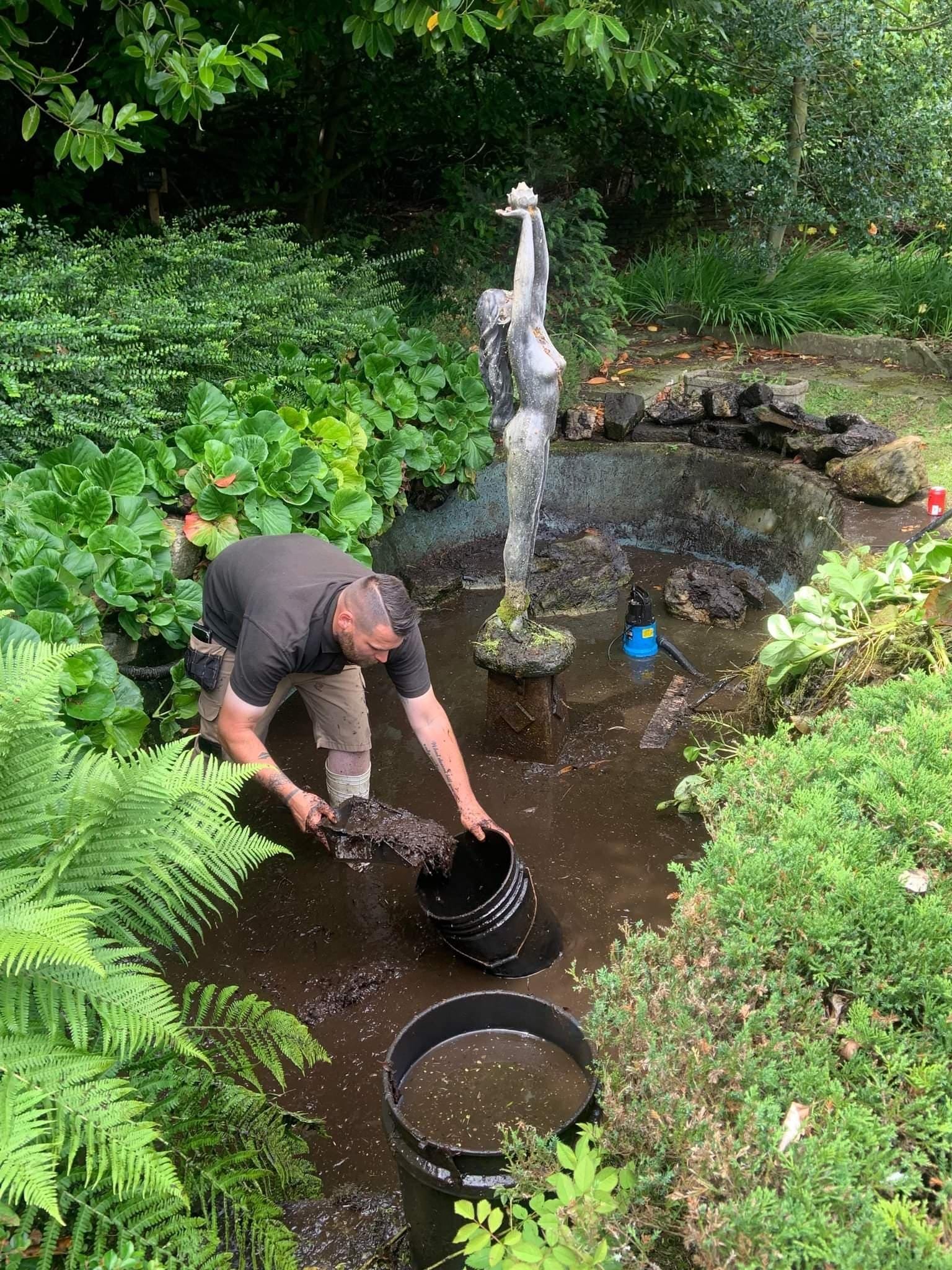 Jamie at work on a pond clean